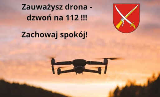 Dron na czerwonym tle